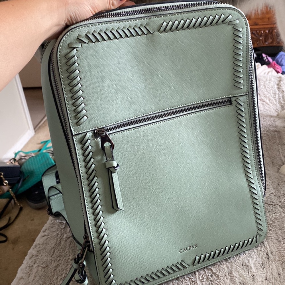 Green Calpak backpack